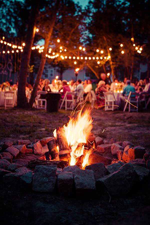 Live pit smoking at a wedding reception